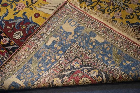 An antique North West Persian Tree of Life yellow ground carpet, 10ft by 6ft 11in.